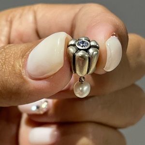 Pandora retired Tulip with Pearl